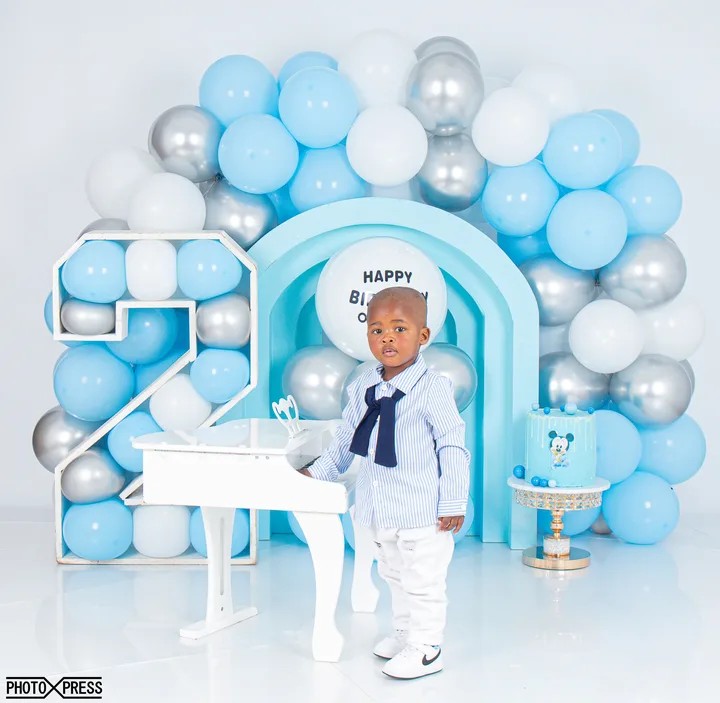 Blue and silver themed birthday balloon arch